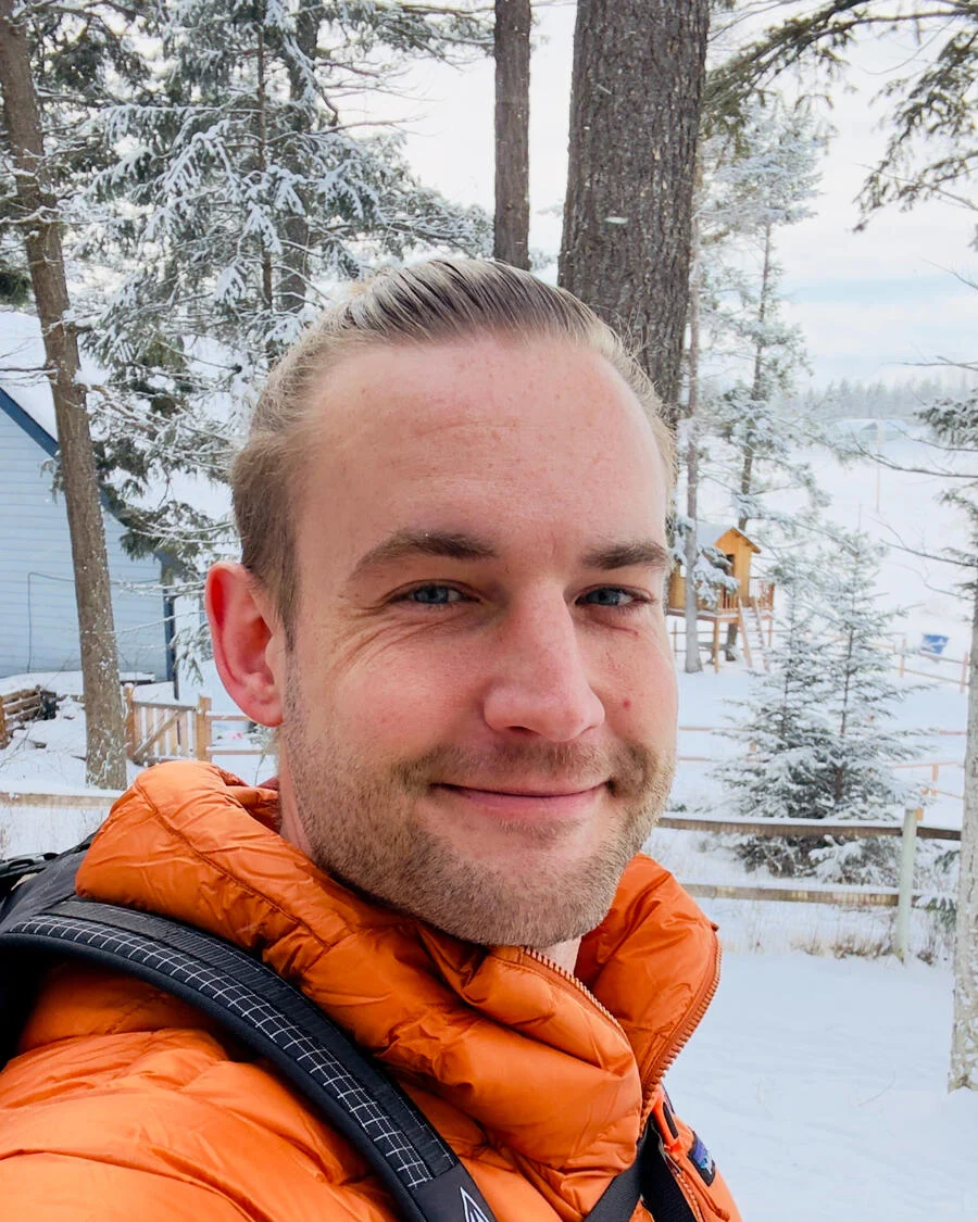 Charlie Dorsey outdoors in a snowy forest